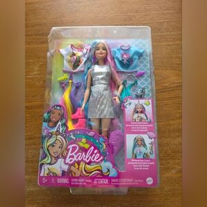 4 Brand New Barbie Dolls, each valued at $30 Plus Dollars Each One.